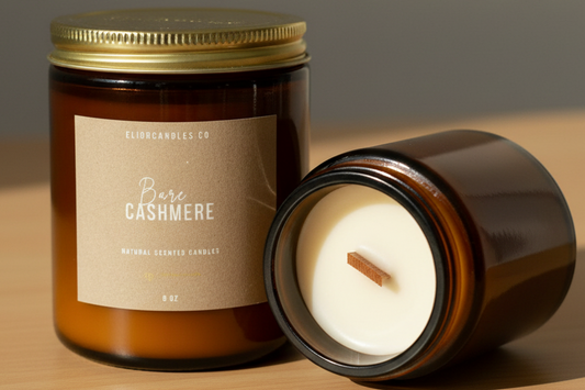 Candle jar with a lid and candle inside on a wooden surface